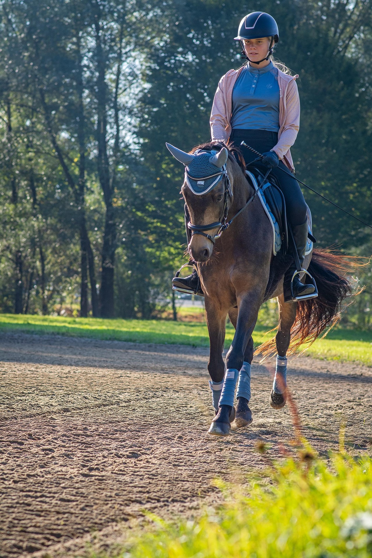 Woman on horseback participating in a charity trail ride event in Nanaimo, British Columbia.